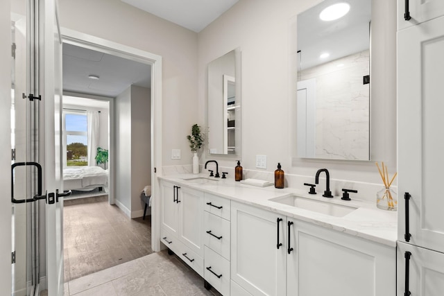 18 Artisan Dr Unit 416, Salem, NH 03079 - ensuite bathroom featuring a marble finish shower and double vanity