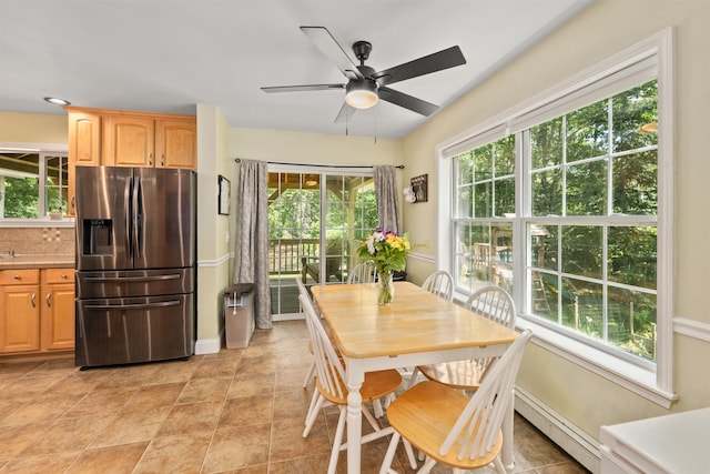 70 Riverside Dr, Allenstown, NH 03275 - dining area with ceiling fan and a baseboard radiator