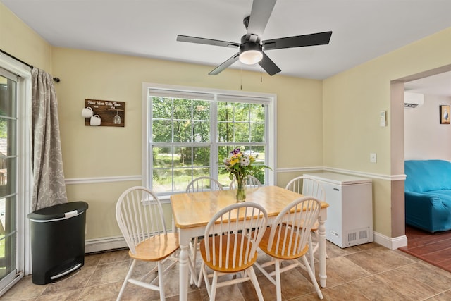 70 Riverside Dr, Allenstown, NH 03275 - dining space featuring a wall mounted AC, ceiling fan, and baseboard heating