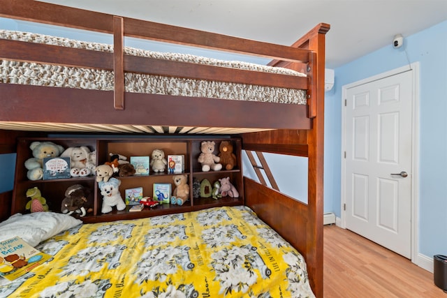 70 Riverside Dr, Allenstown, NH 03275 - bedroom with wood finished floors and baseboard heating