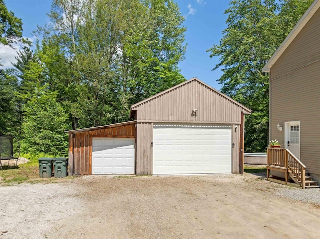 70 Riverside Dr, Allenstown, NH 03275 - detached garage featuring a trampoline