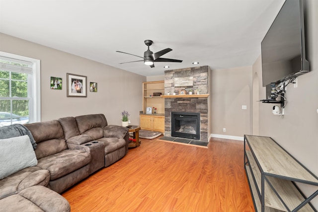 70 Riverside Dr, Allenstown, NH 03275 - living room featuring ceiling fan, light wood-style flooring, a fireplace, and recessed lighting