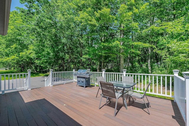 15B Vine St, South Berwick, ME 03908 - wooden deck with grilling area, outdoor dining space, and view of scattered trees