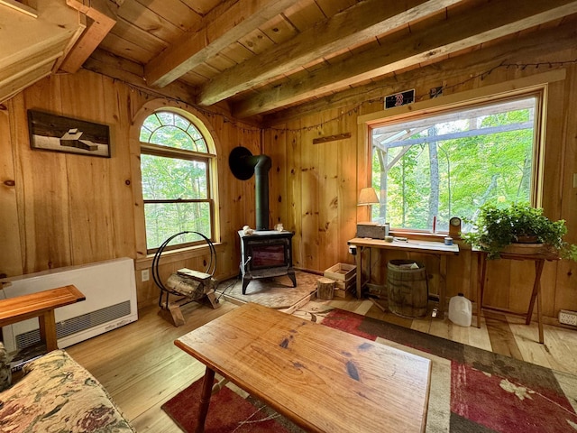 14 Threshold Way, Corinth, VT 05040 - sitting room with a wood stove, wood walls, light wood-style flooring, and a wood ceiling with exposed beams