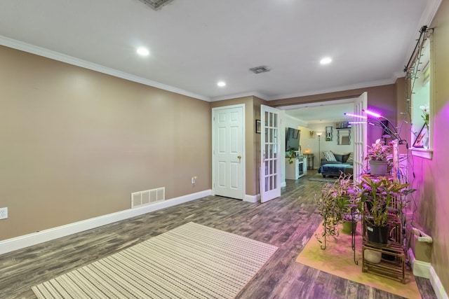 13 Rangers Dr Unit B, Hudson, NH 03051 - sitting room with wood finished floors, crown molding, recessed lighting, and french doors