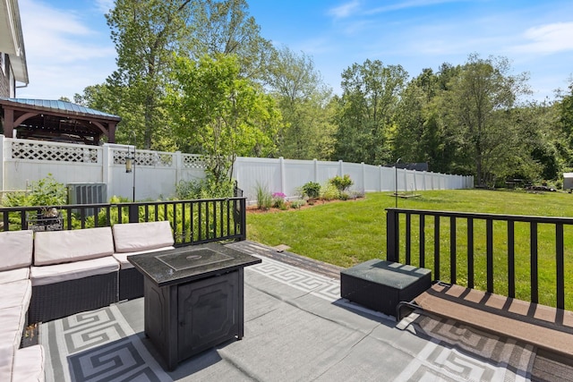 13 Rangers Dr Unit B, Hudson, NH 03051 - fenced backyard featuring an outdoor living space with a fire pit, a patio area, and a gazebo