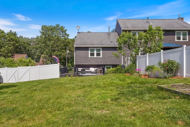 13 Rangers Dr Unit B, Hudson, NH 03051 - rear view of house with a fenced backyard and a shingled roof