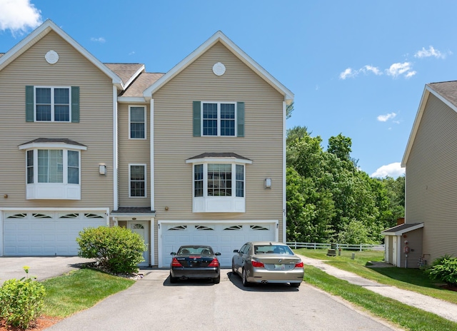 70B Shadowbrook Dr Unit 70B, Hudson, NH 03051 - view of front of house with a garage and asphalt driveway