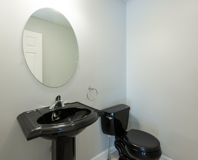 70B Shadowbrook Dr Unit 70B, Hudson, NH 03051 - half bathroom featuring baseboards
