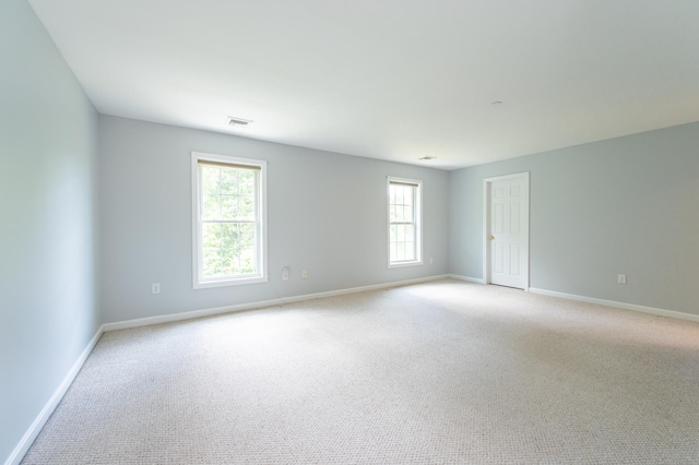 70B Shadowbrook Dr Unit 70B, Hudson, NH 03051 - empty room featuring baseboards and light colored carpet