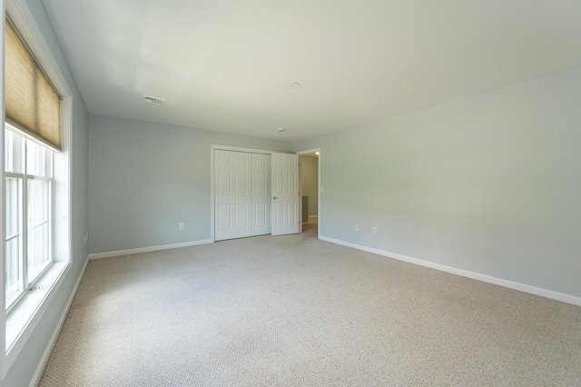 70B Shadowbrook Dr Unit 70B, Hudson, NH 03051 - spare room with light carpet