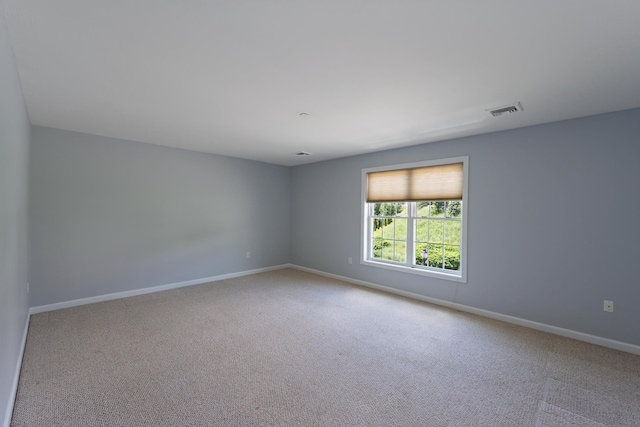 70B Shadowbrook Dr Unit 70B, Hudson, NH 03051 - carpeted empty room featuring baseboards
