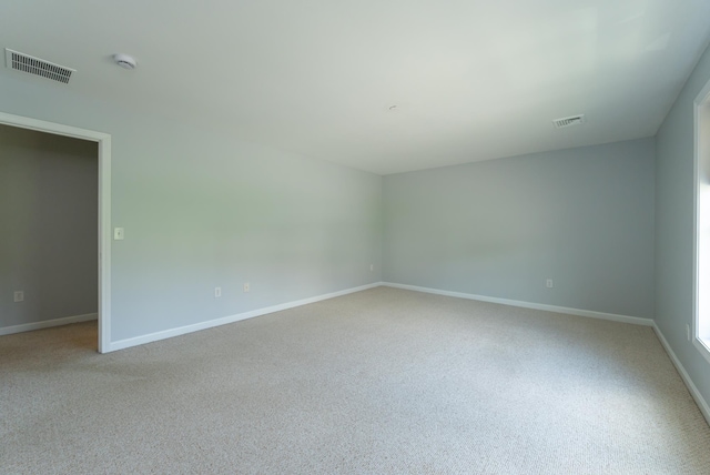 70B Shadowbrook Dr Unit 70B, Hudson, NH 03051 - carpeted empty room featuring baseboards and a smoke detector