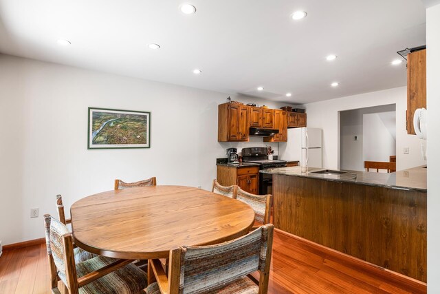 49 Longwood Dr, Grantham, NH 03753 - dining space with recessed lighting and light wood-style flooring