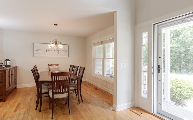 81 Summit Ridge Dr, Keene, NH 03431 - dining room with a chandelier and light wood finished floors
