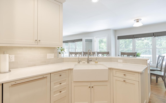 81 Summit Ridge Dr, Keene, NH 03431 - kitchen featuring a peninsula, backsplash, light countertops, and recessed lighting
