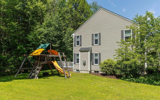 81 Summit Ridge Dr, Keene, NH 03431 - back of house featuring a yard and a playground