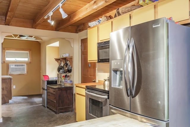 329 Forest Acres Rd, New London, NH 03257 - kitchen featuring appliances with stainless steel finishes, a wood ceiling with exposed beams, concrete floors, a ceiling fan, and rail lighting
