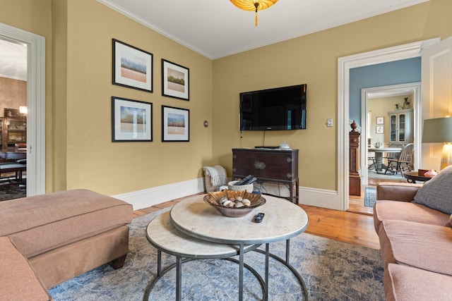 223 Atlantic Ave, North Hampton, NH 03862 - living room with wood finished floors and crown molding