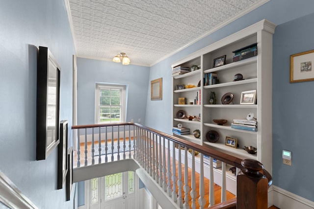 223 Atlantic Ave, North Hampton, NH 03862 - corridor with ornamental molding, an ornate ceiling, and an upstairs landing