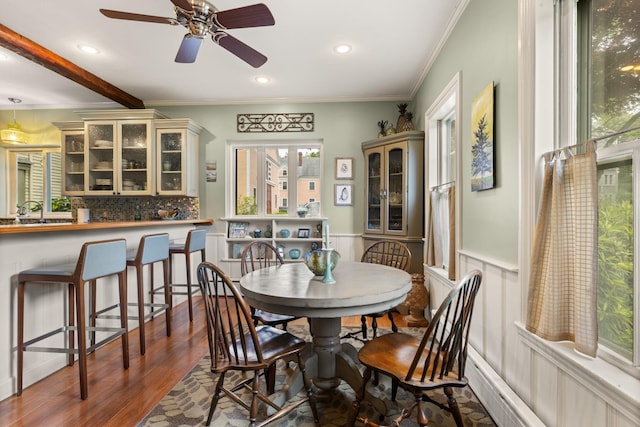 223 Atlantic Ave, North Hampton, NH 03862 - dining space with a wainscoted wall, ornamental molding, wood finished floors, ceiling fan, and recessed lighting