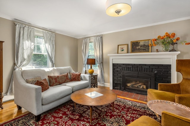 96 Madbury Rd, Durham, NH 03824 - living area with crown molding, a fireplace, plenty of natural light, a baseboard radiator, and wood finished floors