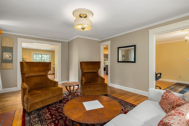 96 Madbury Rd, Durham, NH 03824 - living room featuring wood finished floors, ornamental molding, and a chandelier