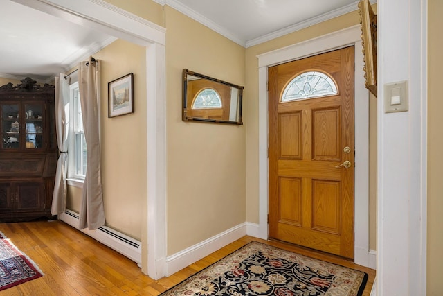 96 Madbury Rd, Durham, NH 03824 - entrance foyer featuring a baseboard radiator, light wood-type flooring, and ornamental molding