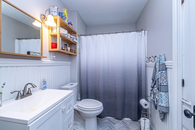 1076 Merrill St, Manchester, NH 03103 - bathroom featuring toilet and vanity