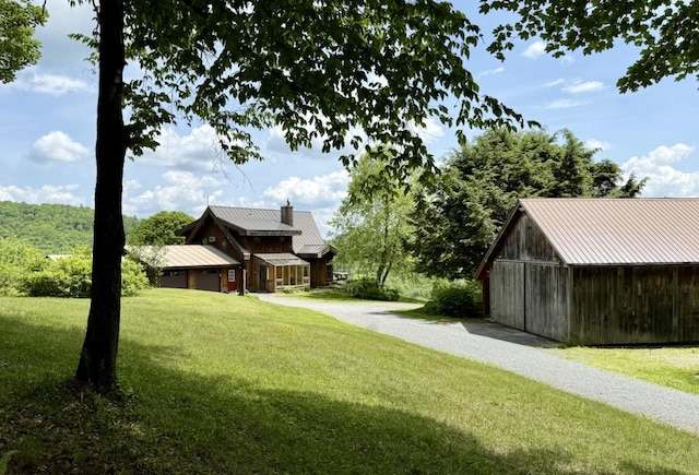 2208-2432 Backway Rd, Corinth, VT 05039 - view of grassy yard with an outbuilding and gravel driveway