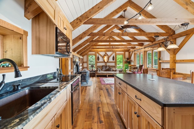 2208-2432 Backway Rd, Corinth, VT 05039 - kitchen featuring dark countertops, black appliances, plenty of natural light, hardwood / wood-style flooring, and wood ceiling