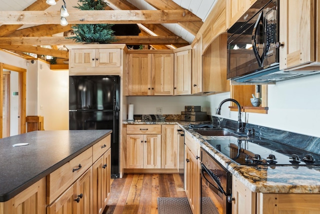 2208-2432 Backway Rd, Corinth, VT 05039 - kitchen with black appliances, light wood-style floors, light brown cabinets, and dark stone counters
