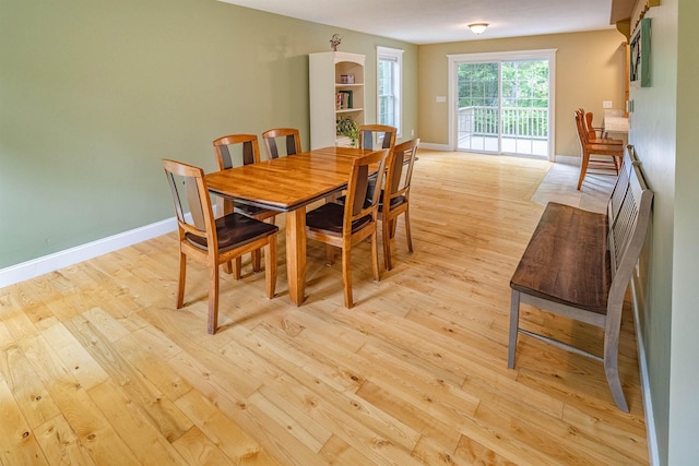 203 Blackwater Rd, Somersworth, NH 03878 - dining space featuring light wood-style flooring and baseboards