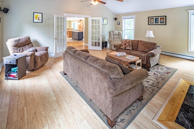 203 Blackwater Rd, Somersworth, NH 03878 - living room featuring french doors, a ceiling fan, a baseboard heating unit, lofted ceiling, and wood finished floors