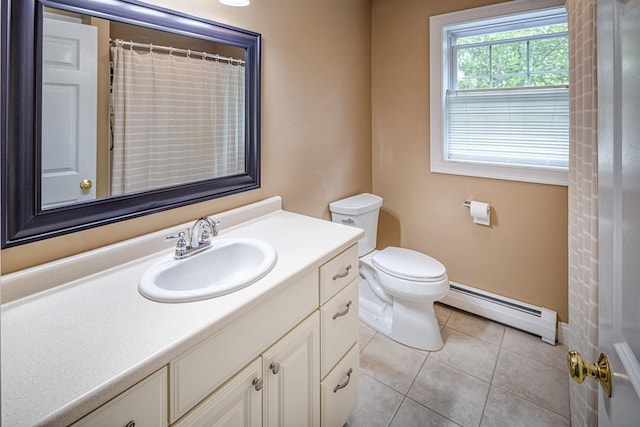 203 Blackwater Rd, Somersworth, NH 03878 - bathroom with baseboard heating, vanity, and tile patterned floors