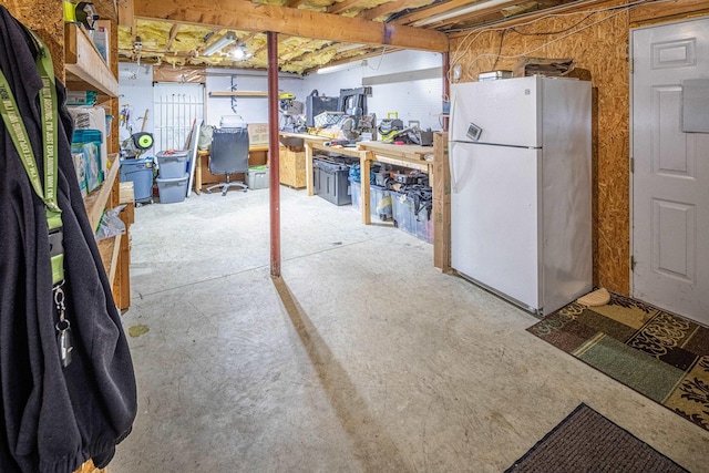 203 Blackwater Rd, Somersworth, NH 03878 - unfinished basement featuring freestanding refrigerator