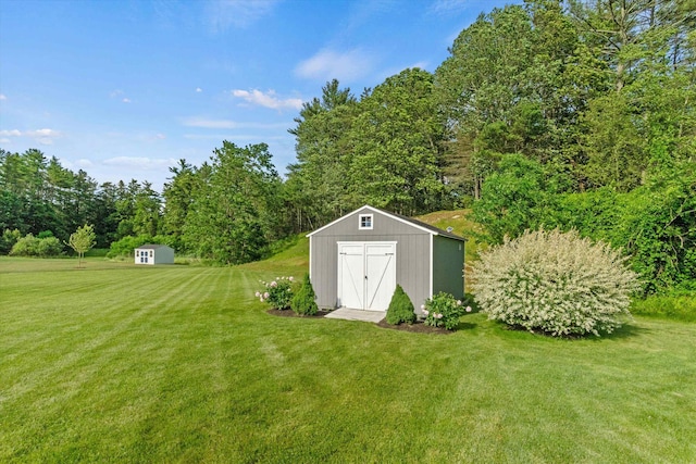 16 Daniels Dr, Lee, NH 03861 - view of green lawn with a storage shed