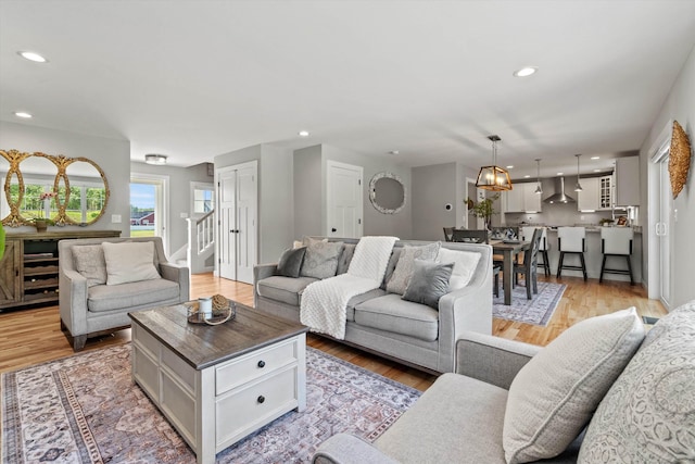 16 Daniels Dr, Lee, NH 03861 - living room with light wood-style flooring, recessed lighting, and stairs