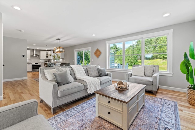 16 Daniels Dr, Lee, NH 03861 - living room with plenty of natural light, light wood-type flooring, and recessed lighting