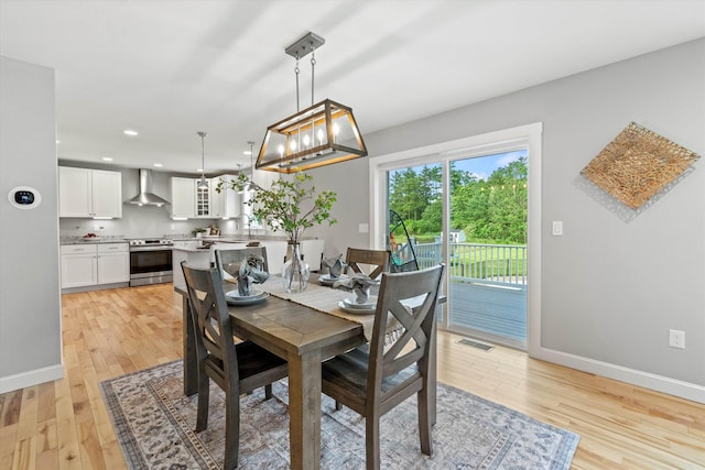 16 Daniels Dr, Lee, NH 03861 - dining room with light wood-style flooring and recessed lighting