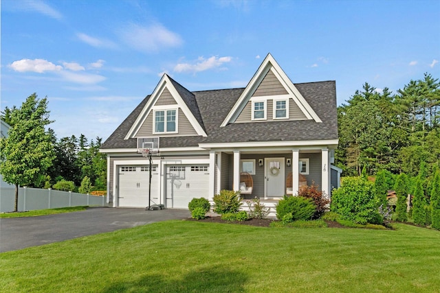16 Daniels Dr, Lee, NH 03861 - view of front of property with asphalt driveway, covered porch, and roof with shingles