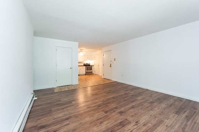 5 Autumn Leaf Dr Unit 24, Nashua, NH 03060 - unfurnished living room featuring a baseboard heating unit, wood finished floors, and a ceiling fan