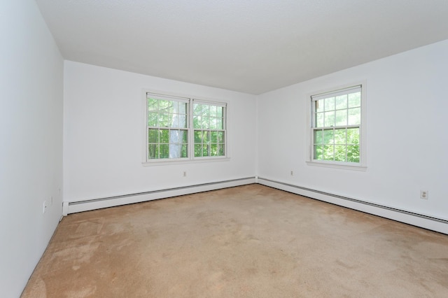 5 Autumn Leaf Dr Unit 24, Nashua, NH 03060 - carpeted spare room with healthy amount of natural light and a baseboard radiator