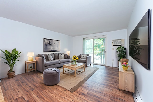 5 Autumn Leaf Dr Unit 24, Nashua, NH 03060 - living area featuring wood finished floors, a wall unit AC, and baseboard heating