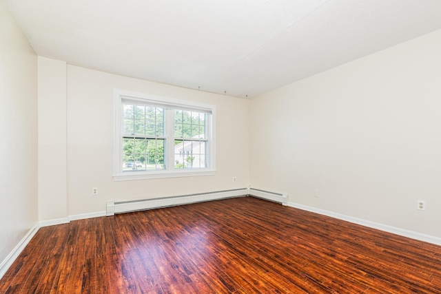 703 Springbrook Cir, Portsmouth, NH 03801 - empty room featuring wood finished floors and a baseboard radiator