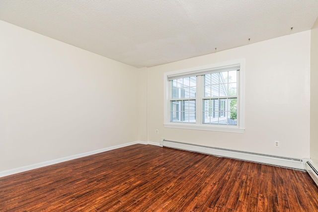 703 Springbrook Cir, Portsmouth, NH 03801 - empty room featuring wood finished floors and a baseboard heating unit