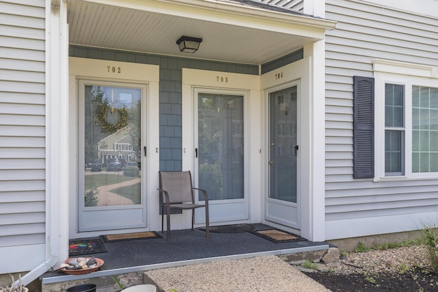 703 Springbrook Cir, Portsmouth, NH 03801 - entrance to property with a porch