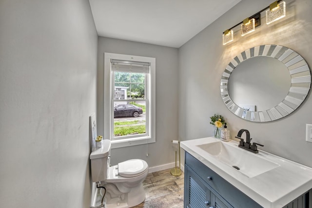 86 Chestnut St, Claremont, NH 03743 - half bath with vanity and wood finished floors