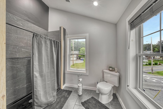 86 Chestnut St, Claremont, NH 03743 - full bath with a shower stall, healthy amount of natural light, and vaulted ceiling