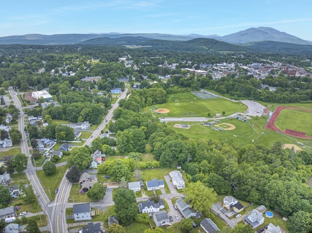 86 Chestnut St, Claremont, NH 03743 - aerial view of property and surrounding area featuring mountains